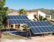 96241699_ejeytp_two_large_solar_panels_in_a_garden_in_spain-large-230x180