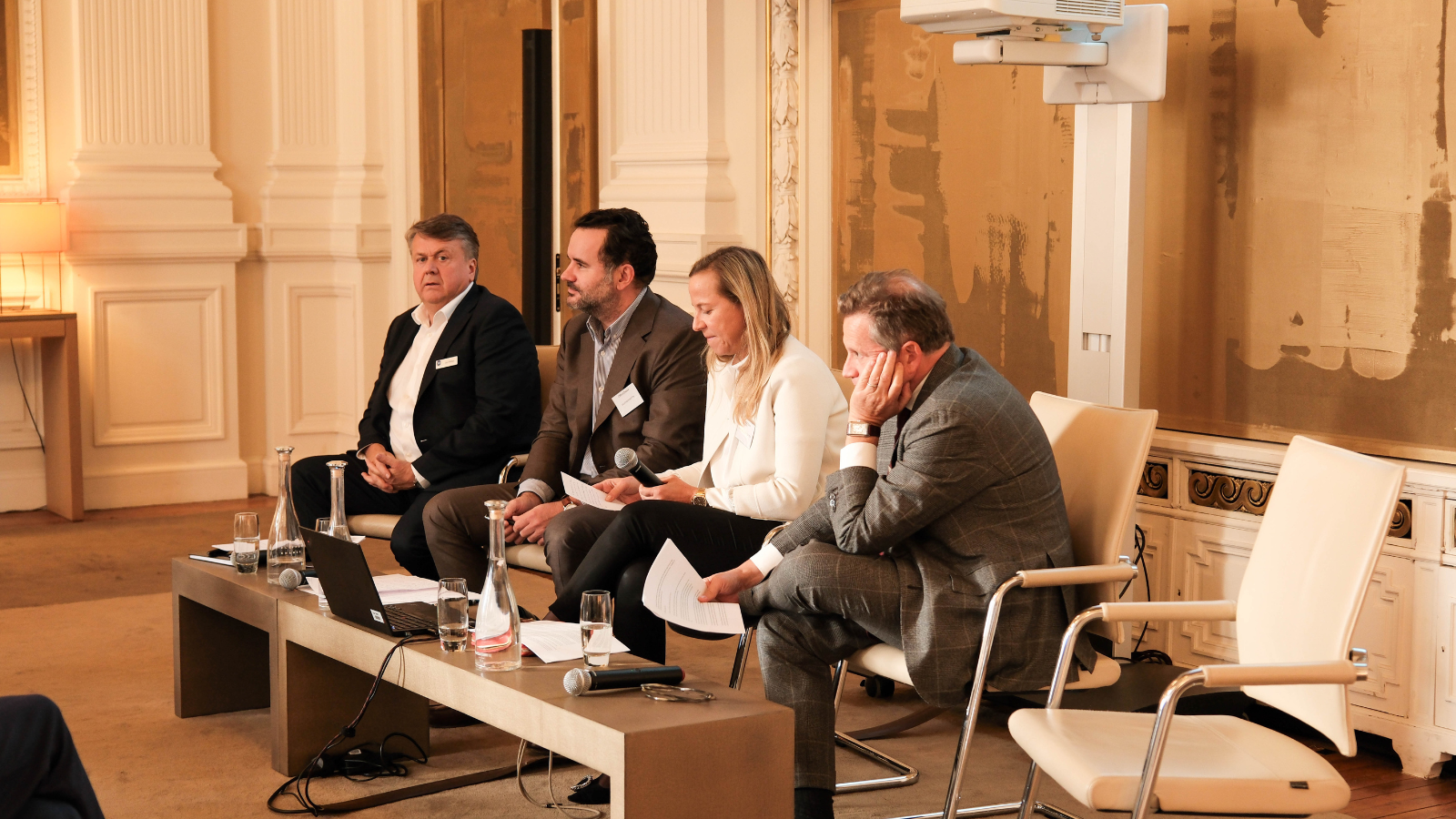 Infraweek panel sits together listening attentively.